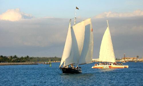 Sailing Schooner America 2 and one of the Sebago sunset cruise boats off Key West