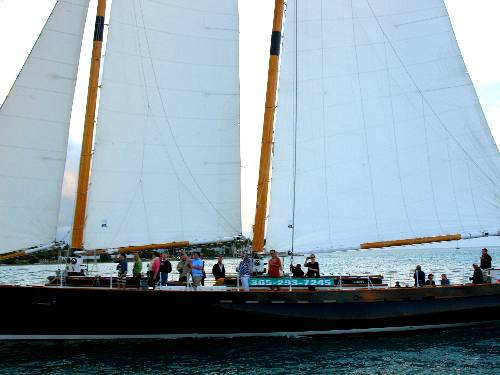 America 2 fast sailing schooner sailing past Sunset Pier in Key West