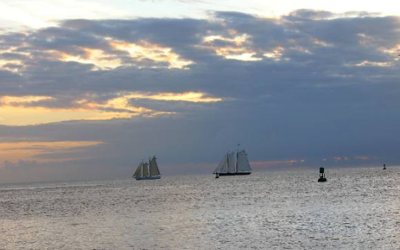 Sailing schooners Adirondack III and America 2 sailing off Key West during one of their sunset cruises in February 2012