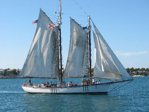 Old sailing schooner Appledore sailing near Sunset Key west of Key West, Florida
