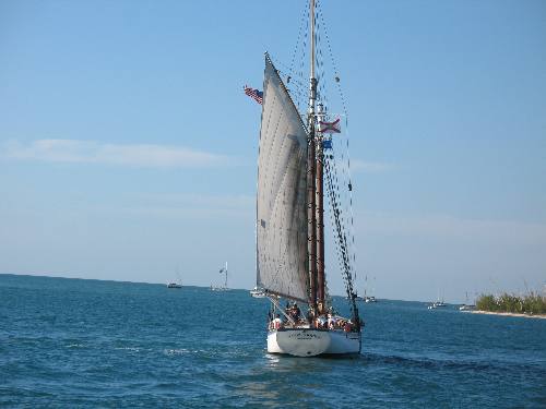 Schooner Appledore sailing off Key West with Christmas Tree Island in the background