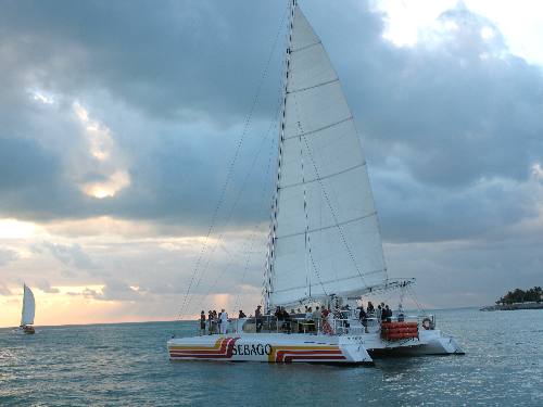 One of the Sebago fleet passing by Mallory Square in Key West