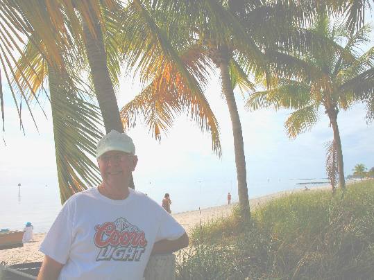 Mike posing with a lovely coconut palm tree