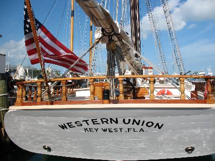 American flag flying on the schooner Western Union docked in Key West Bight Marina