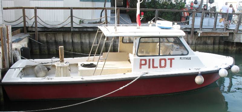 Pilot boat ready for action at dock in the historic old seaport at Key West Bight Marina