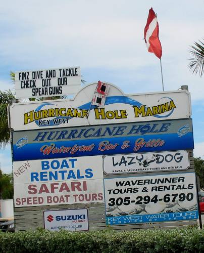 Hurricane Hole Marina sign along US-1 in Key West, Florida