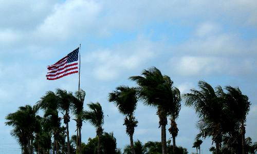 Flag flying on Pigeon Key that the 7-mile bridge passes close to around midway across