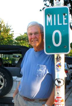 Mike Hendrix with the US-1 MILE 0 sign located on Whitehead Street in Key West