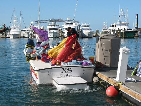 This boat docked in Key West Bight Marina is preparing their "chute" for the next group