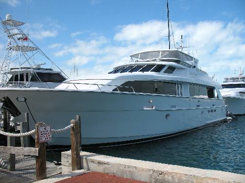 Mega private yacht tied alongside dock in Key West Bight Marina