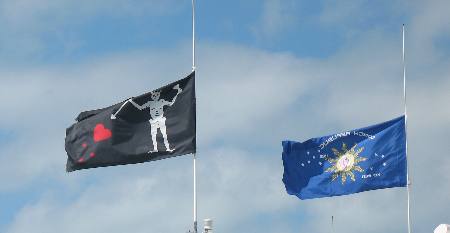 Party flags flying from private yacht in Key West Bight Marina