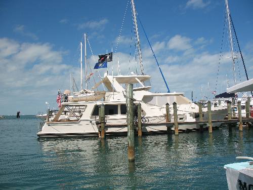 Private yacht tied alongside dock in Key West Bight Marina