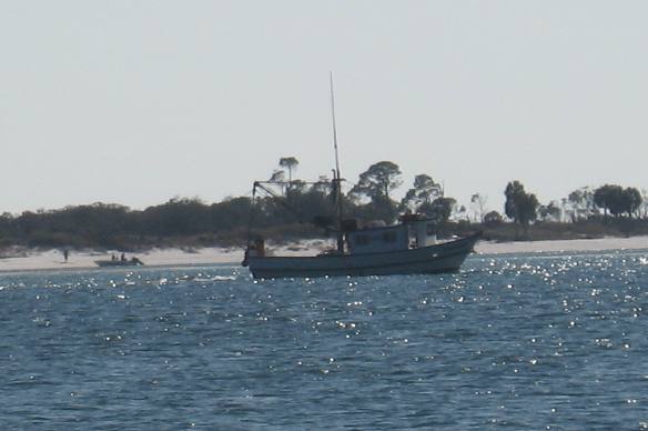 Jellyfish boat pulling trawl nets in pass off St Andrews State Park