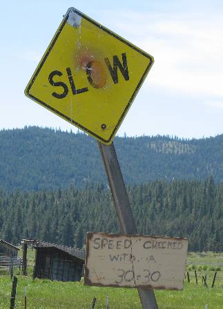 A slow speed sign with a warning: Speed checked with a 30-30