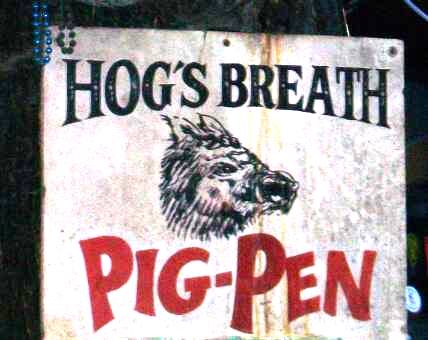 Parking lot sign for Hog's Breath Restaurant in Key West